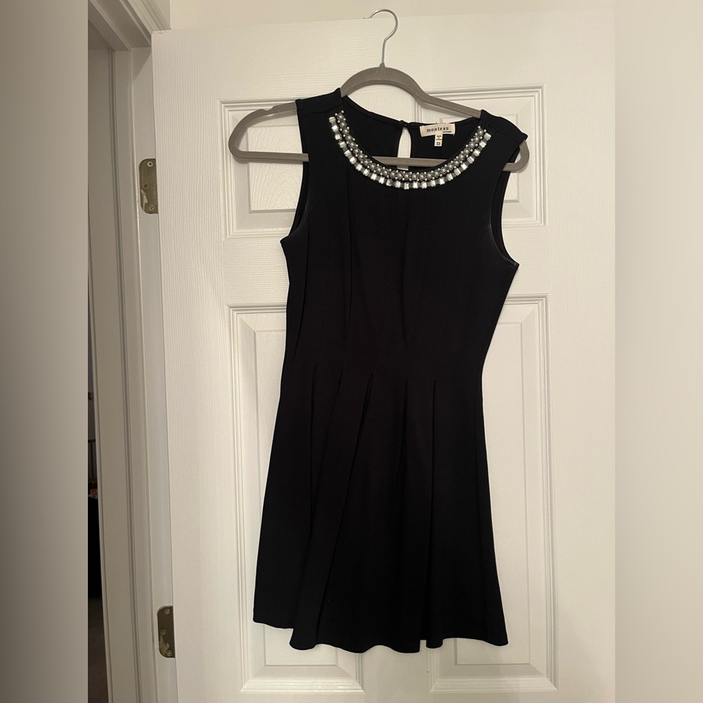 Elegant Black Dress with Embellished Neckline